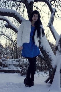 White Quilted Puffer Jacket with Blue Accents