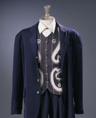 Man's shirt, unbleached cotton with machine embroidery, designed by Workers for Freedom, Great Britain, 1990.