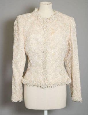 Victor Edelstein, Spring-Summer 1992. Jacket and skirt in cream silk overlaid with machine embroidery