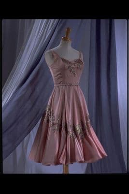 Embroidered silk satin evening dress with matching belt, designed by Owen Hyde Clark for Worth London,  London, ca. 1955.
