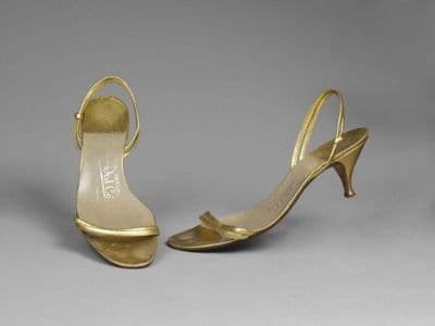 Pair of gold sandals, designed by James Galanos, USA, 1960s.