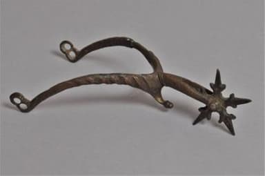 Medieval Copper Rowel Spur with Gilt Traces
