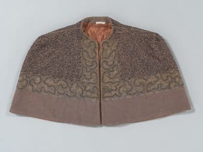 Gray beaded capelet with fur collar and trim