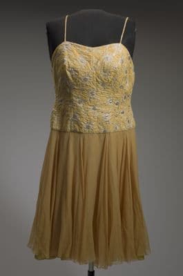 Yellow cocktail dress designed by Don Loper and worn by Ella Fitzgerald