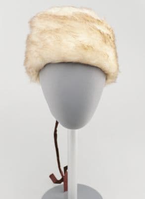 Grey and cream faux fur hat with brown ribbon