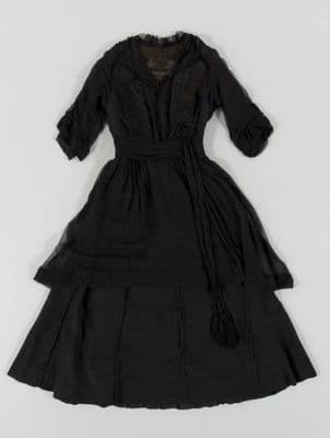 Black silk dress with crepe overlay and embroidery