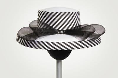 White hat with striped trims and black bow