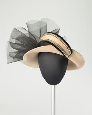 Pale peach hat with black net and gold bead accents