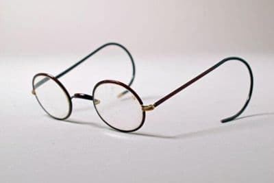 Pair of black rimmed spectacles, probably made in England, 20th century
