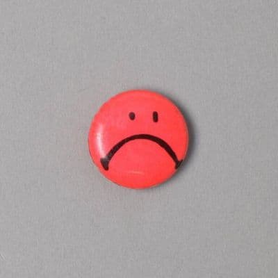 Fluorescent Red Frowning Smiley Face Pin Badge