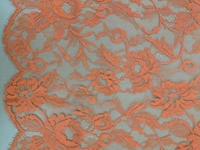 Salmon pink coloured lace sari with scalloped edge, possibly made in China. 1970s-80s