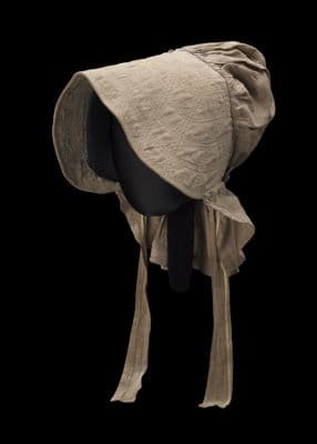 Taupe bonnet with cross-stitched brim worn by the enslaved woman Martha Barnes